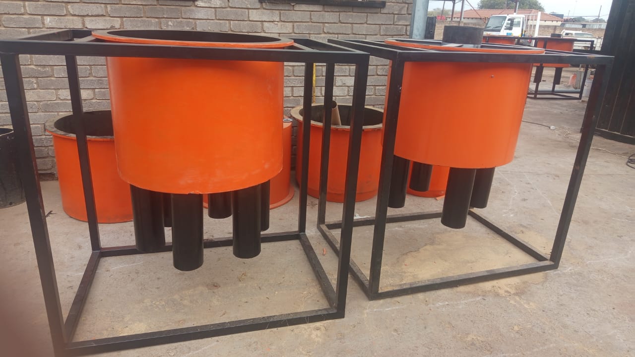 Orange distributors in workshop frames